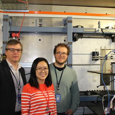 Two men and a woman inside the ChipIr beamline