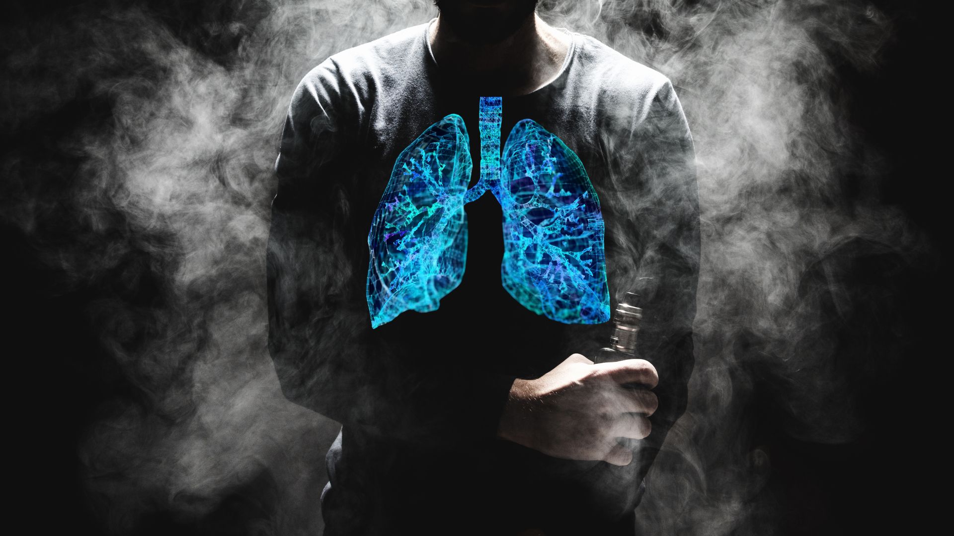 A man vaping, with his lungs highlighted in blue