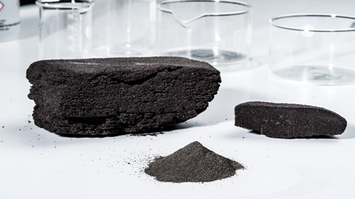 Example of regolith samples derived from ESA funded GSTP project (3D printing of a model building block for a lunar base outer shell). Image credit: DLR-Cologne. ​