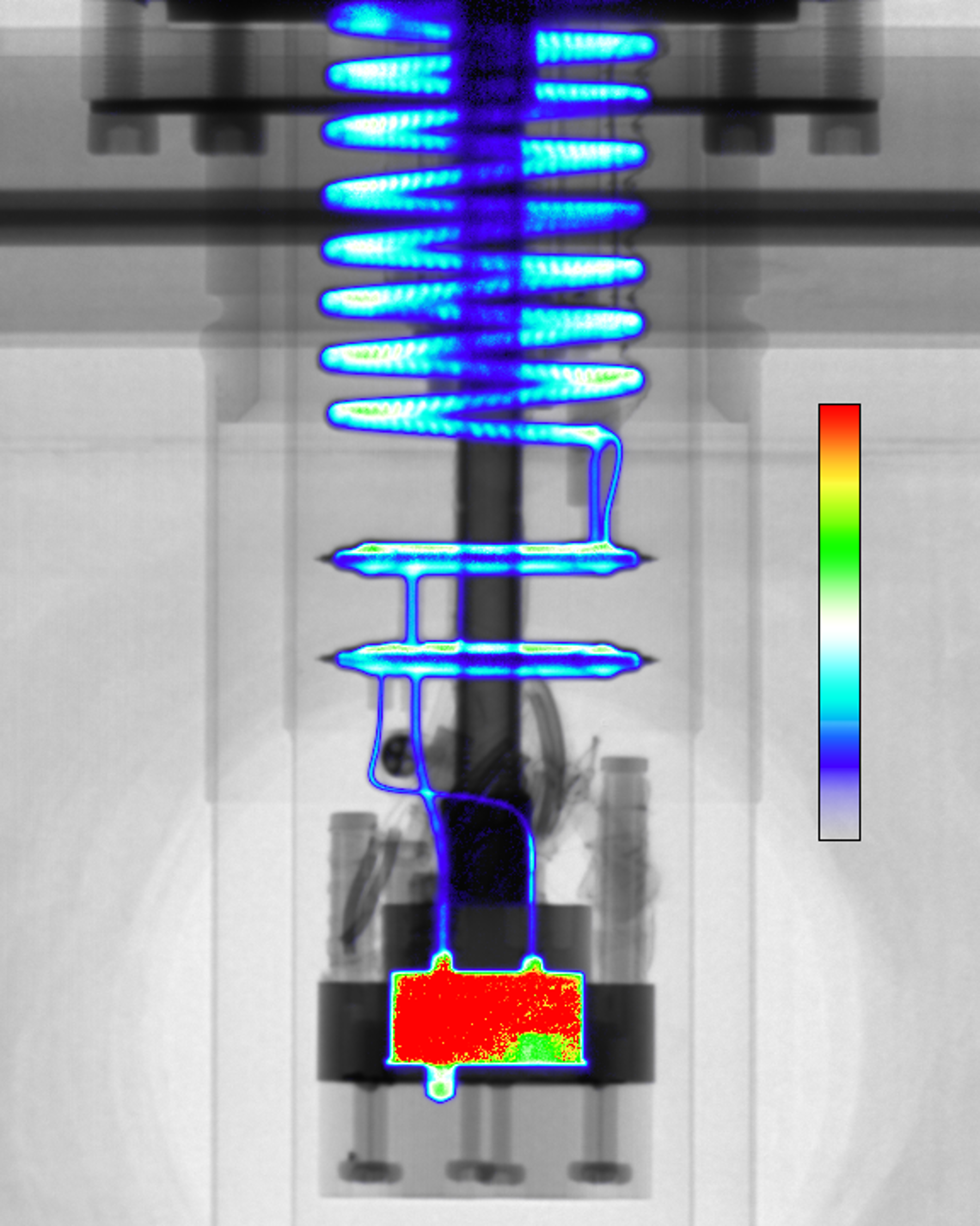 The inside of a dilution fridge, with the inside liquid highlighted in blue